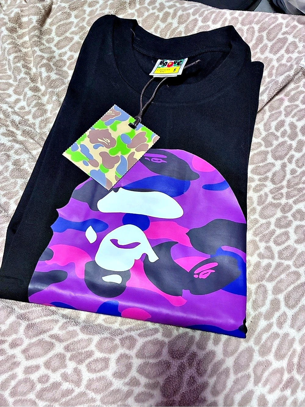 A Bathing Ape Color Camo Big Ape Head Tee Camo Graphic Tee in Black & Purple